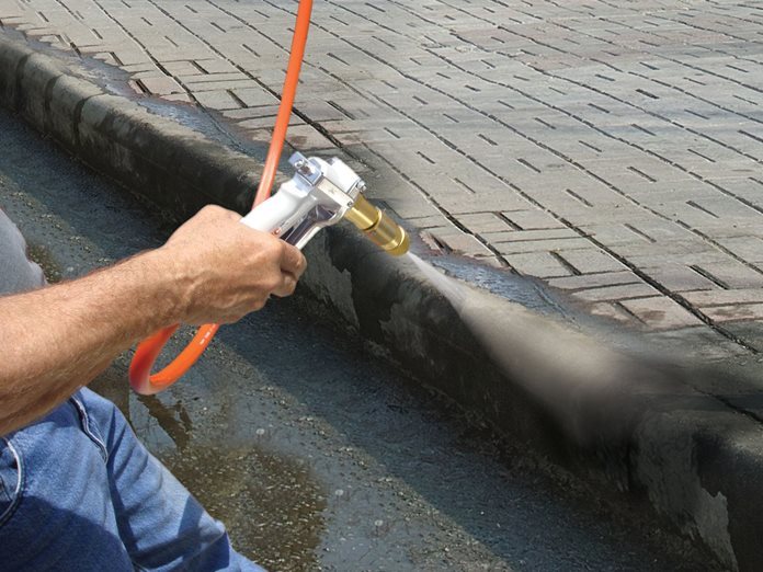 Spraying Sidewalk